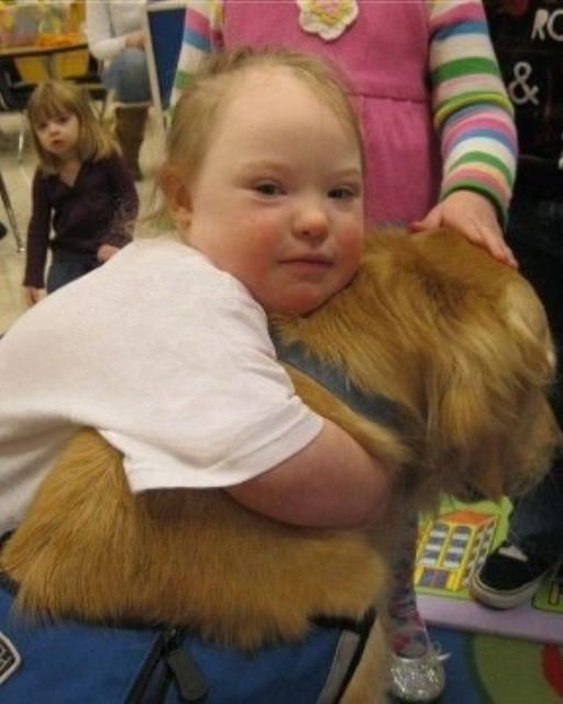 My Daughter Stayed Silent Around Her Classmates—Until She Encountered the Dog Wearing the Blue Vest